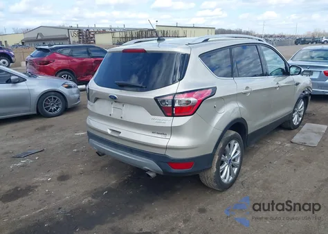 2017 Ford Escape Titanium z USA, uszkodzony, nr VIN 1FMCU0JD8HUB59464